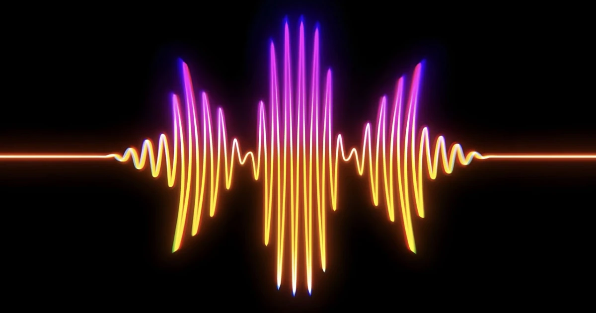 Glowing orange and purple sound wave on a black background.